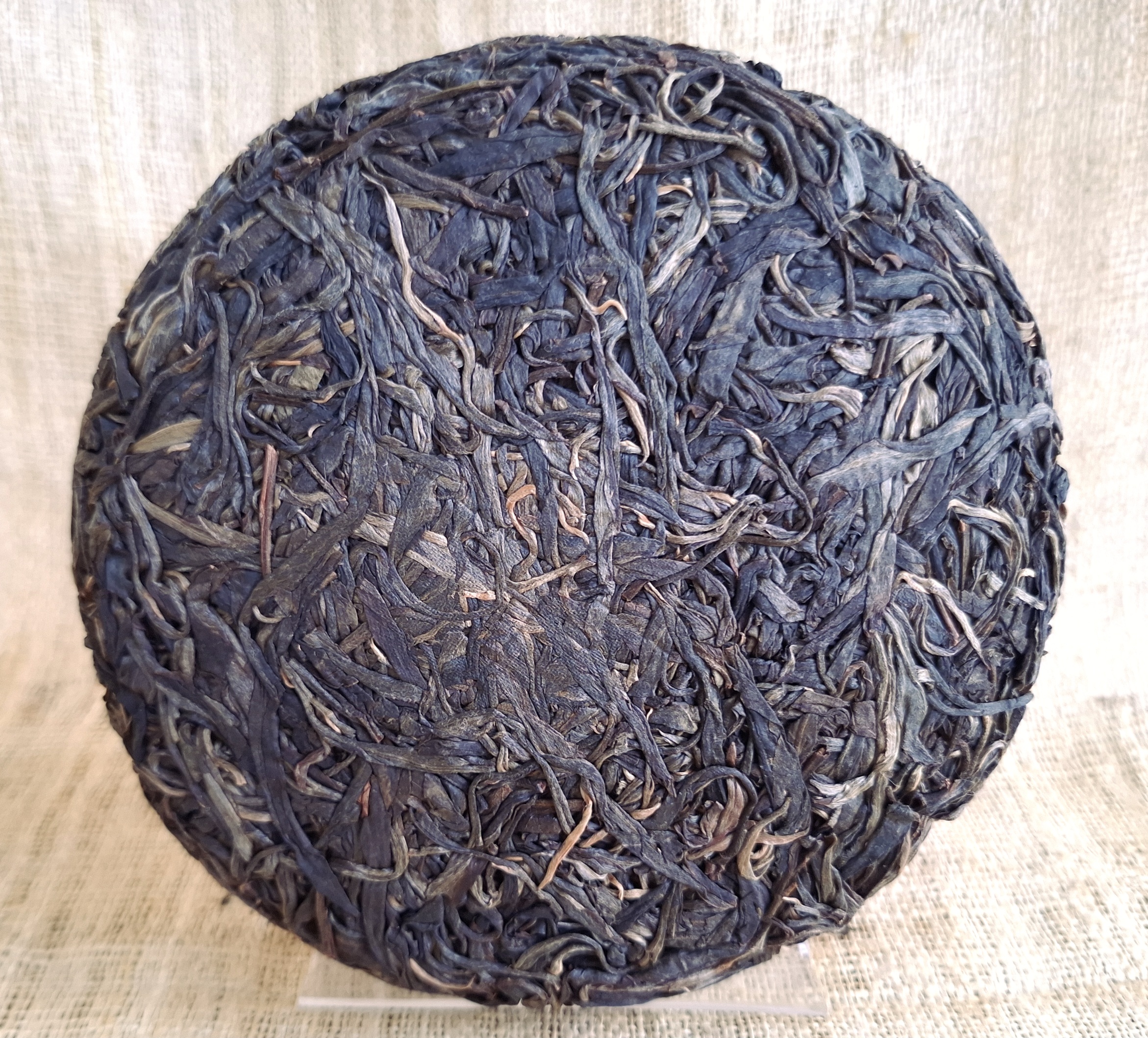 xiao meng song shui ku puer cake front